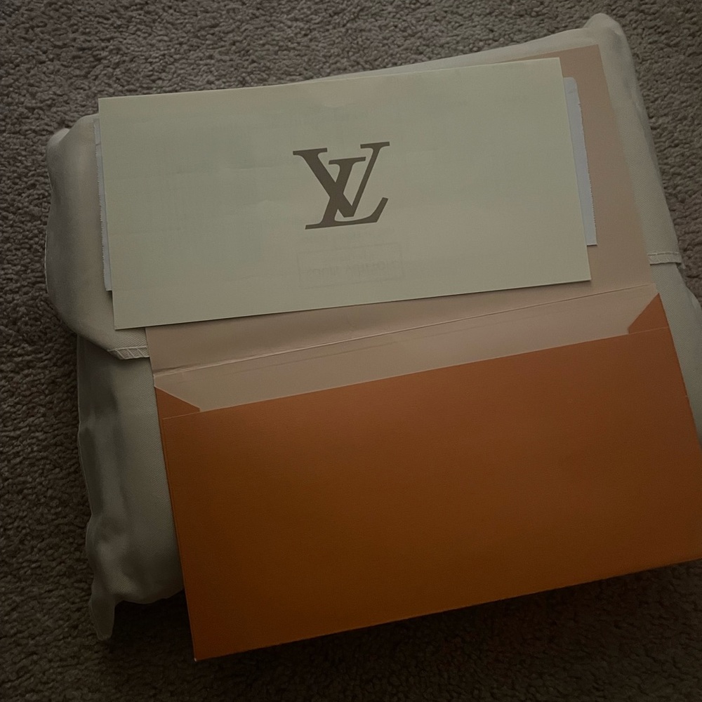 Louis Vuitton crossbody bag (black, leather)